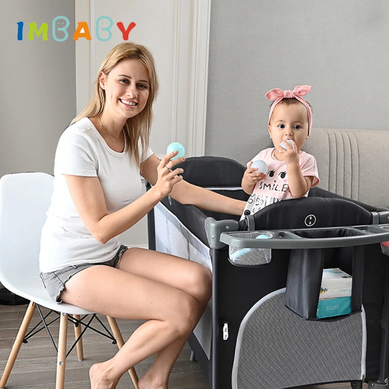 IMBABY Newborn Baby Bed - Multifunctional Foldable Baby Cot with Diaper Table