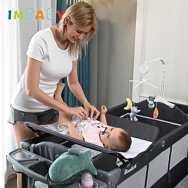 IMBABY Portable Baby Crib with Diaper Table - Multifunctional Playpen Crib