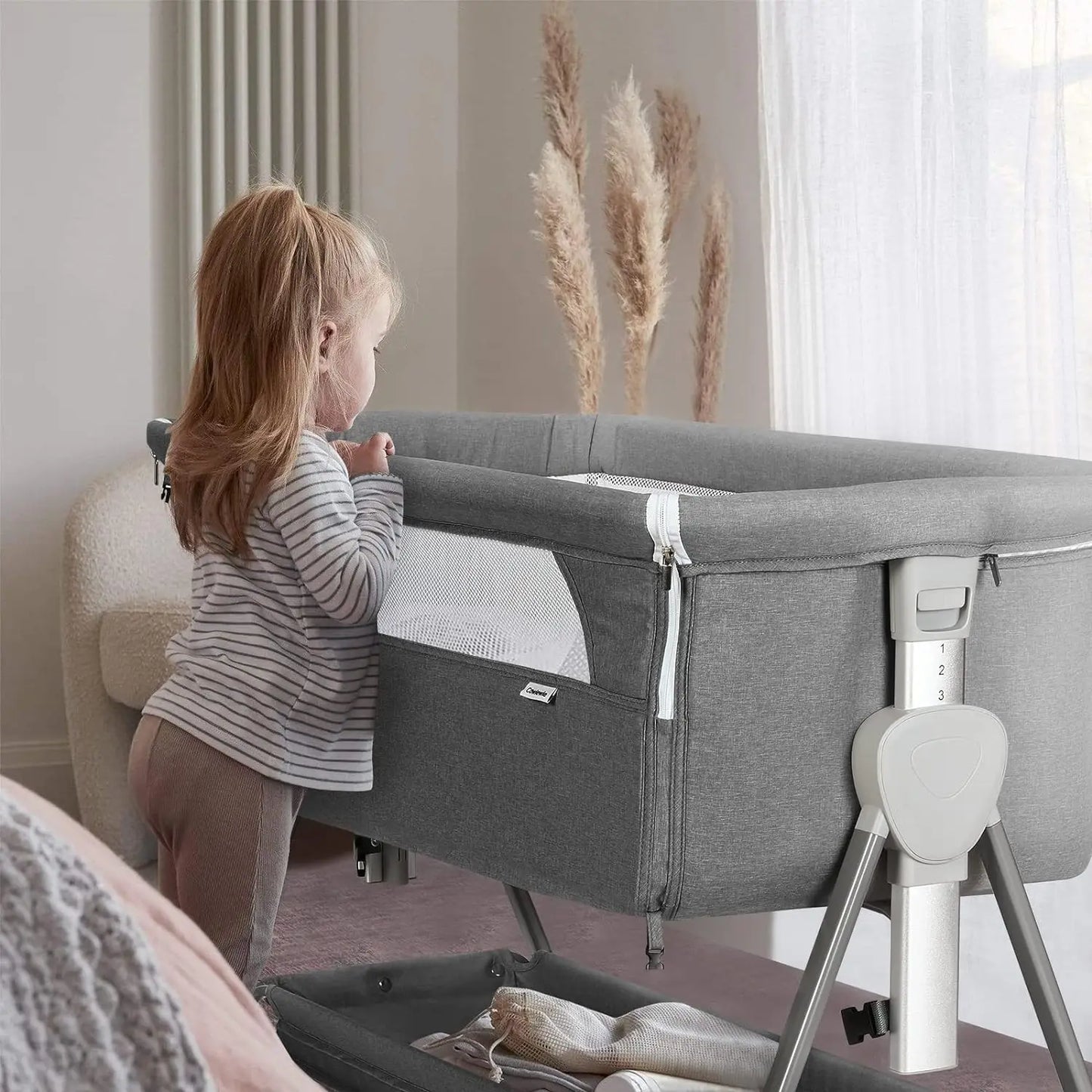 Baby Bassinet – Beside Sleeper for Baby with Easy Folding Design, Storage Basket, and Wheels to Reduce Mom's Fatigue